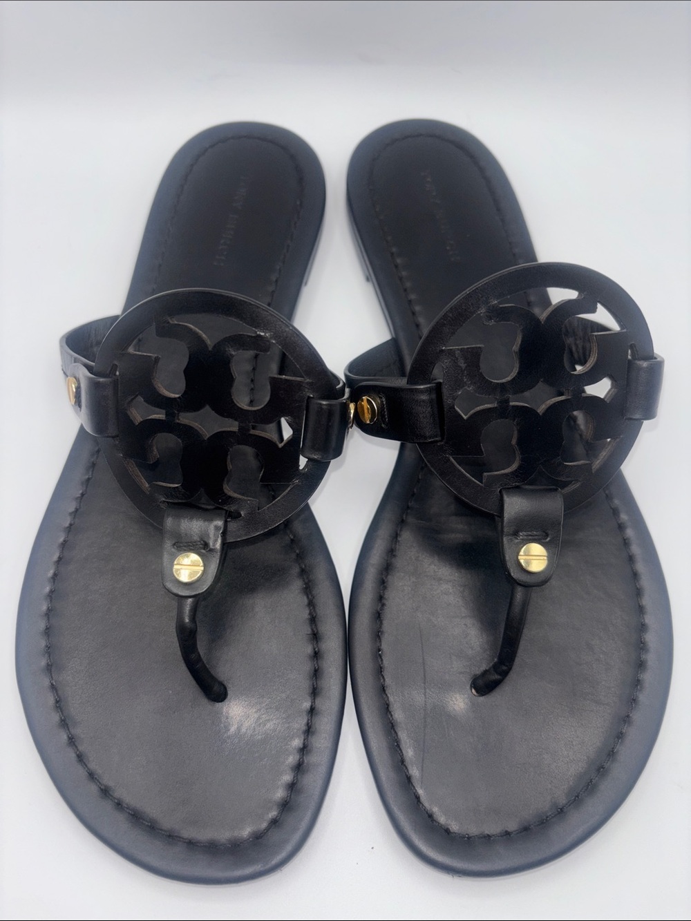 Tory Burch Miller Black Logo Cutout Thong Sandals with Gold Accents